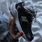 725 black/White textile and suede running shoes for style and comfort