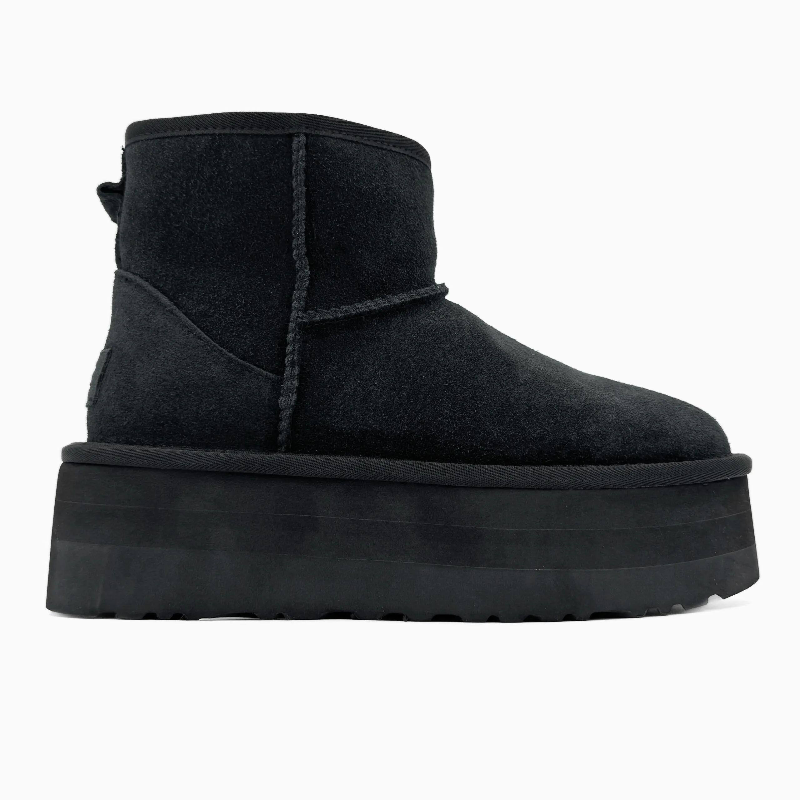 3dde2c63-38ff-48d5-adc4-badd268d4a16 Ugg Classic Mini Platform XL black suede ankle boots with fur - Image 1