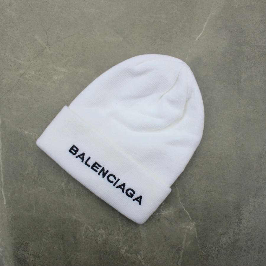 443e666c-88dd-4def-8c76-1b536848c411 BALENCIAGA white hat-stylish and warm for any season - Image 1