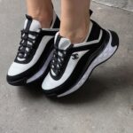 Sneakers Chanel Black / White-Stilvolle Leder- und Textil-Sneakers