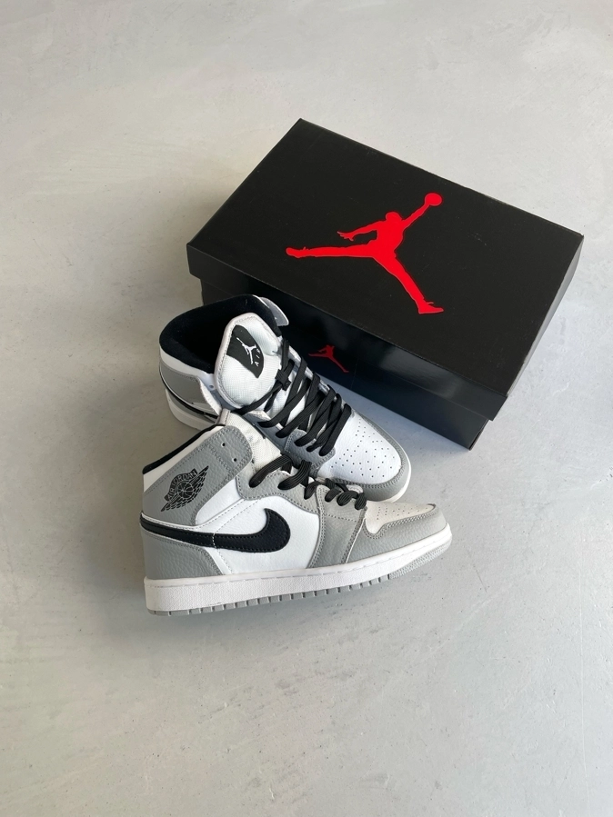 b8a60793-9b3e-4ab8-8167-c9ca3f7f9f00 Air Jordan 1 Grey sneakers-stylish grey sneakers for everyday wear - Image 1
