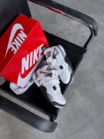 Sneakers Air Jordan 4 Retro Cement Bianco Grigio in pelle e pelliccia