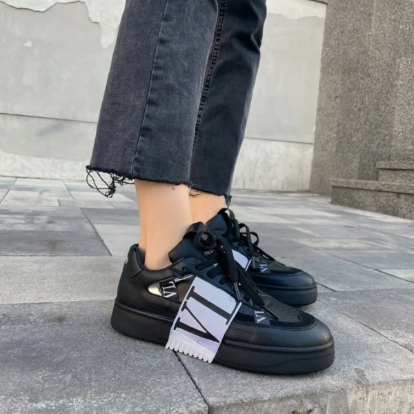 Valentino Black leather sneakers, elegant and stylish for everyday wear